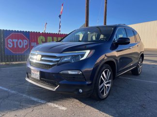 Used 2016 Honda Pilot Touring image 1