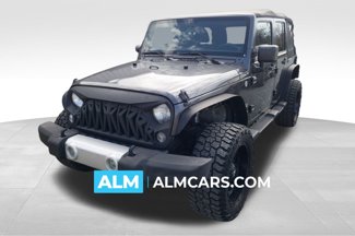Used 2014 Jeep Wrangler Unlimited Sahara w/ Connectivity Group image 1