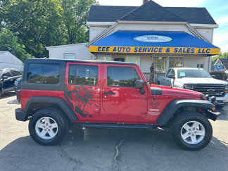 Used 2011 Jeep Wrangler Unlimited Sport image 1