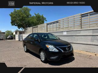 Used 2015 Nissan Versa SV image 1