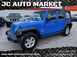 Used 2011 Jeep Wrangler Unlimited Sport image 1