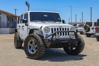 Used 2014 Jeep Wrangler Unlimited Sahara w/ Max Tow Package image 1