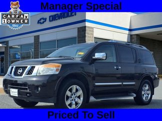 Used 2011 Nissan Armada Platinum w/ 2nd Row Captain Seat Pkg image 1