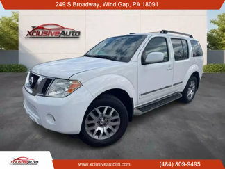 Used 2011 Nissan Pathfinder LE w/ Navigation Pkg image 1