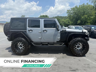 Used 2014 Jeep Wrangler Unlimited Sport image 1