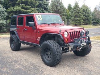 Used 2013 Jeep Wrangler Unlimited Sahara image 1