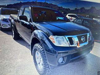 Used 2012 Nissan Frontier SV image 1