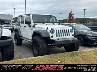 Used 2013 Jeep Wrangler Unlimited Rubicon w/ Dual Top Group image 1