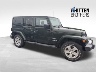 Used 2011 Jeep Wrangler Unlimited Sahara w/ Dual Top Group image 1