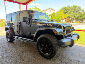 Used 2013 Jeep Wrangler Unlimited Rubicon w/ Dual Top Group image 1