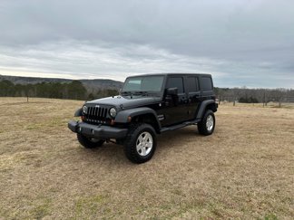 Used 2012 Jeep Wrangler Unlimited Sport image 1
