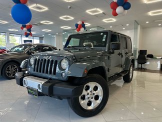 Used 2014 Jeep Wrangler Unlimited Sahara w/ Dual Top Group image 1