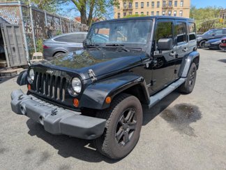 Used 2013 Jeep Wrangler Unlimited Sahara w/ Dual Top Group image 1