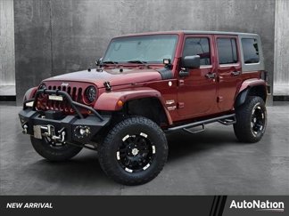 Used 2010 Jeep Wrangler Unlimited Sahara w/ Dual Top Group image 1