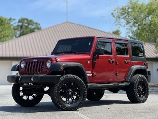 Used 2012 Jeep Wrangler Unlimited Sport image 1