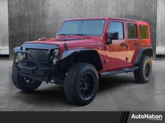 Used 2016 Jeep Wrangler Unlimited Sahara w/ Connectivity Group image 1