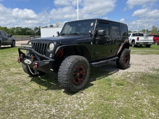 Used 2014 Jeep Wrangler Unlimited Sahara image 1