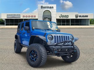Used 2014 Jeep Wrangler Unlimited Sport image 1