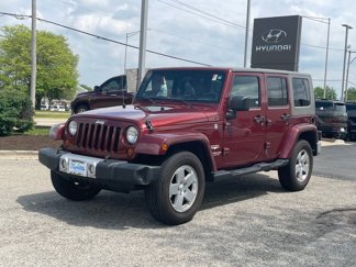Used 2010 Jeep Wrangler Unlimited Sahara w/ Dual Top Group image 1