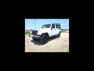 Used 2012 Jeep Wrangler Unlimited Sahara image 1