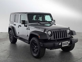Used 2016 Jeep Wrangler Unlimited Sport image 1