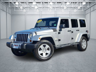 Used 2012 Jeep Wrangler Unlimited Sahara w/ Dual Top Group image 1
