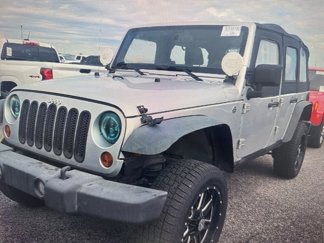 Used 2012 Jeep Wrangler Unlimited Sport image 1