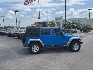 Used 2012 Jeep Wrangler Unlimited Sport image 1