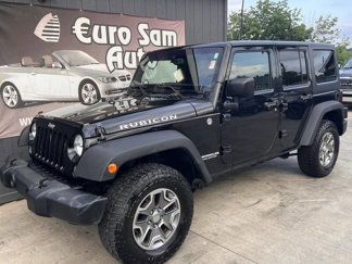 Used 2015 Jeep Wrangler Unlimited Rubicon w/ Dual Top Group image 1