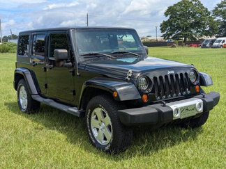 Used 2011 Jeep Wrangler Unlimited Sahara w/ Connectivity Group image 1