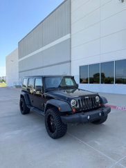 Used 2011 Jeep Wrangler Unlimited Sport image 1