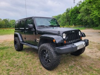 Used 2013 Jeep Wrangler Unlimited Sahara image 1