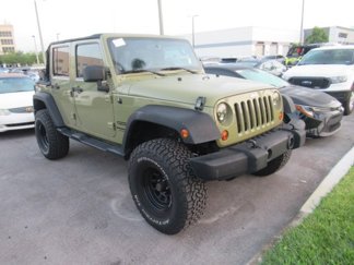 Used 2013 Jeep Wrangler Unlimited Sport image 1