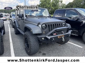 Used 2013 Jeep Wrangler Unlimited Sport image 1