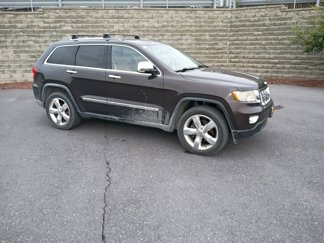 Used 2012 Jeep Grand Cherokee Overland Summit image 1