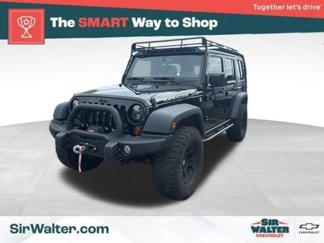 Used 2013 Jeep Wrangler Unlimited Rubicon w/ Dual Top Group image 1