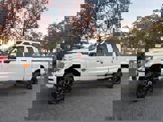 Used 2014 Ford F350 Platinum w/ FX4 Off-Road Package image 1