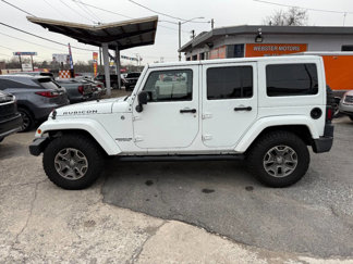 Used 2015 Jeep Wrangler Unlimited Rubicon w/ Dual Top Group image 1