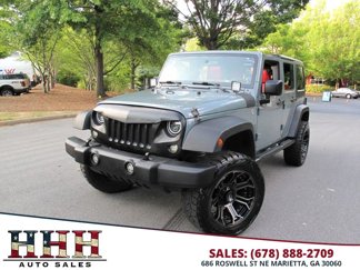 Used 2014 Jeep Wrangler Unlimited Sport w/ Mopar Black Appearance Group image 1