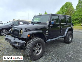 Used 2014 Jeep Wrangler Unlimited Sahara image 1