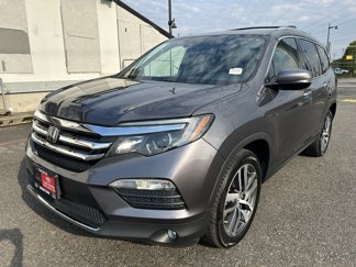 Used 2017 Honda Pilot Touring image 1