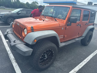 Used 2011 Jeep Wrangler Unlimited Sport image 1