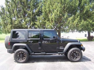 Used 2013 Jeep Wrangler Unlimited Sport image 1