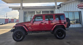 Used 2012 Jeep Wrangler Unlimited Sahara w/ Connectivity Group image 1