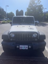 Used 2016 Jeep Wrangler Unlimited Sport image 1