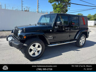 Used 2010 Jeep Wrangler Unlimited Sahara w/ Dual Top Group image 1