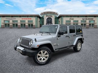 Used 2015 Jeep Wrangler Unlimited Sahara w/ Dual Top Group image 1