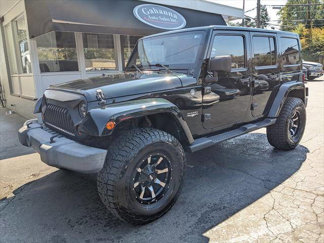 Used 2012 Jeep Wrangler Unlimited Sahara w/ Dual Top Group image 1