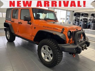 Used 2012 Jeep Wrangler Unlimited Rubicon w/ Dual Top Group image 1