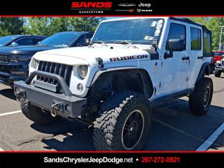 Used 2011 Jeep Wrangler Unlimited Rubicon w/ Dual Top Group image 1